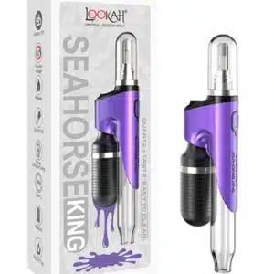 electric dab pen with purpe and black dicast body and see throuch plasitc draw tube on one end and quartz tip coil on the other