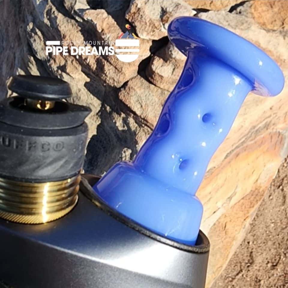 4 inch tall with sky blue color and small nothces up and down the center of the glass