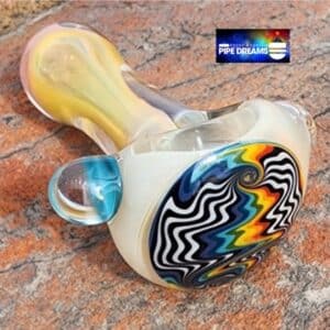 Great glass hand pipe gold color with realy sweet wigwag design on the front all fumed witll change color and has a opal on the side of it