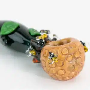 Empire Glasswork’s Bee Hive spoon pipe. with beehive , drips and buzzing bees.
