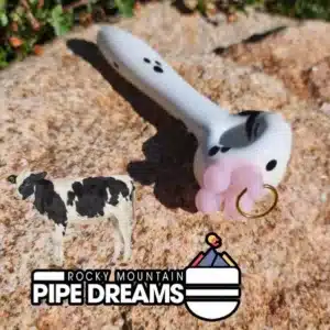 cow hand pipe with utters and ear ring made in Colorado