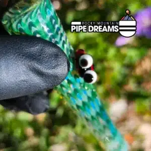 Critter Hitter with Ladybug on it, made here in colorful colorado Travis Radtke and Travis Glass Co. Really nice work on this piece, the ladybug is a nice touch, with no extremeties sticking off the chillum, its a smooth move in and out of the pocket with this 3.5inch piece. Sweet color work and glass and pattern...great gift, for yourself!